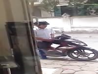 Pulling his pud on his moped