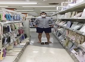Ballsy Asian lad strips down in store