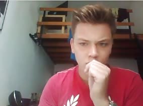 Nervous young guy spreads his cheeks