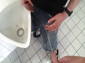 Piss on my buddy before jerking into a urinal