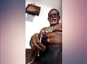 Granddad jacks his big black cock