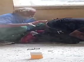 Homeless dude blows crack smoke up another homeless dudes ass