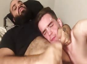 Burly bear busts in his young friends face