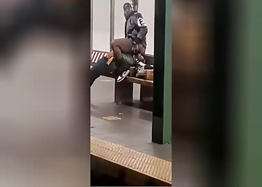 Brotha gets his ass eaten while waiting for train