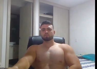 Hot man shows his muscles and his cum on cam