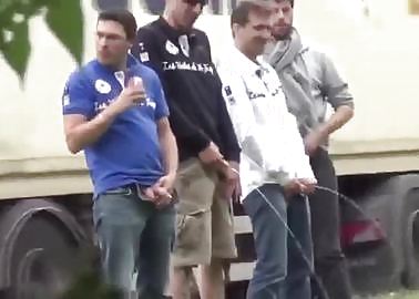Multiple boys caught pissing on the side of the road