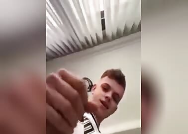 Cute twink jerks off his dick after a basketball game