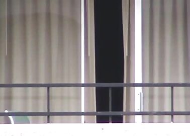 Stripping Naked on the Balcony