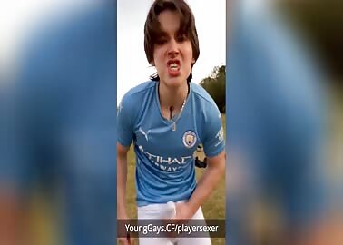 Young soccer player jerking off on the field