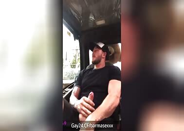 Muscular guy jerking off in the car