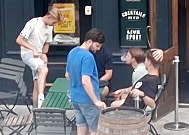 Guy Rubs Ass Through Shorts While Friend Shares Dick Slip