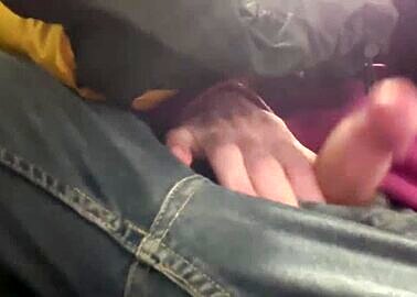 Uncut furry bloke plays with dick on busy train