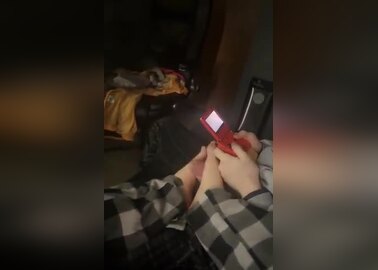 friend gets a helping hand whilst gaming
