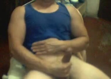 Hunk in blue tank top flex then cums