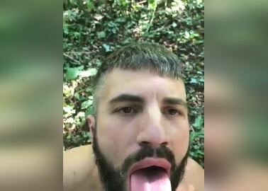 Bearded hunk sucking cum