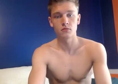 handsome boy milks his big cock