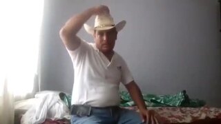 mexican cowboy getting undressed