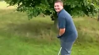 friend whips it out on the golf course