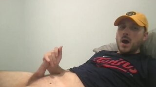 Cap Guy Wanking and Cumming on His Belly