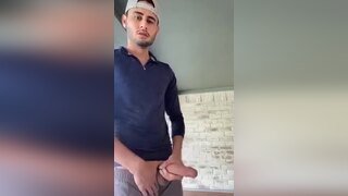 Hot Dude proudly stroking his meaty weapon