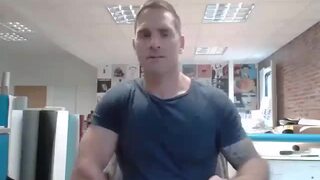 muscular guy releases his cum at his office