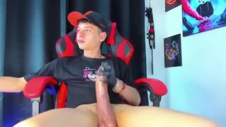 Moises strokes his massive uncut meat until he cums