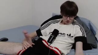 Nerdy Twink Showing His Hairy Hole and Stroking His Big Cut Cock